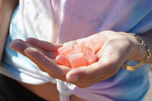 Delta 8 Dosing - Delta 8 Edibles - Gummies Held in Hand - Galaxy Treats in the U.S.