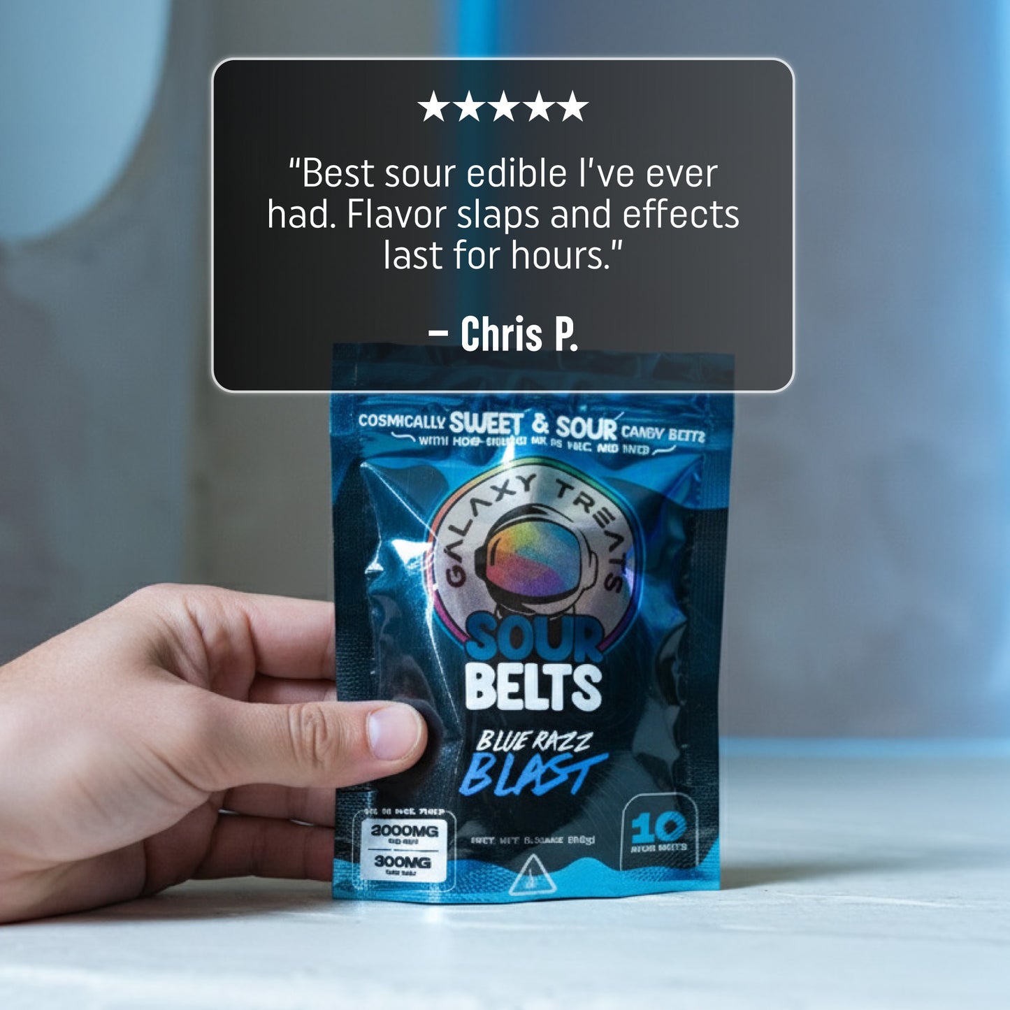 Bluerazz Blast Sour Belts - High Potency 300MG THC Blueberry Flavored Edibles - Hand Holding Packaging - 5 Star Testimonial Review - Galaxy Treats in the U.S.