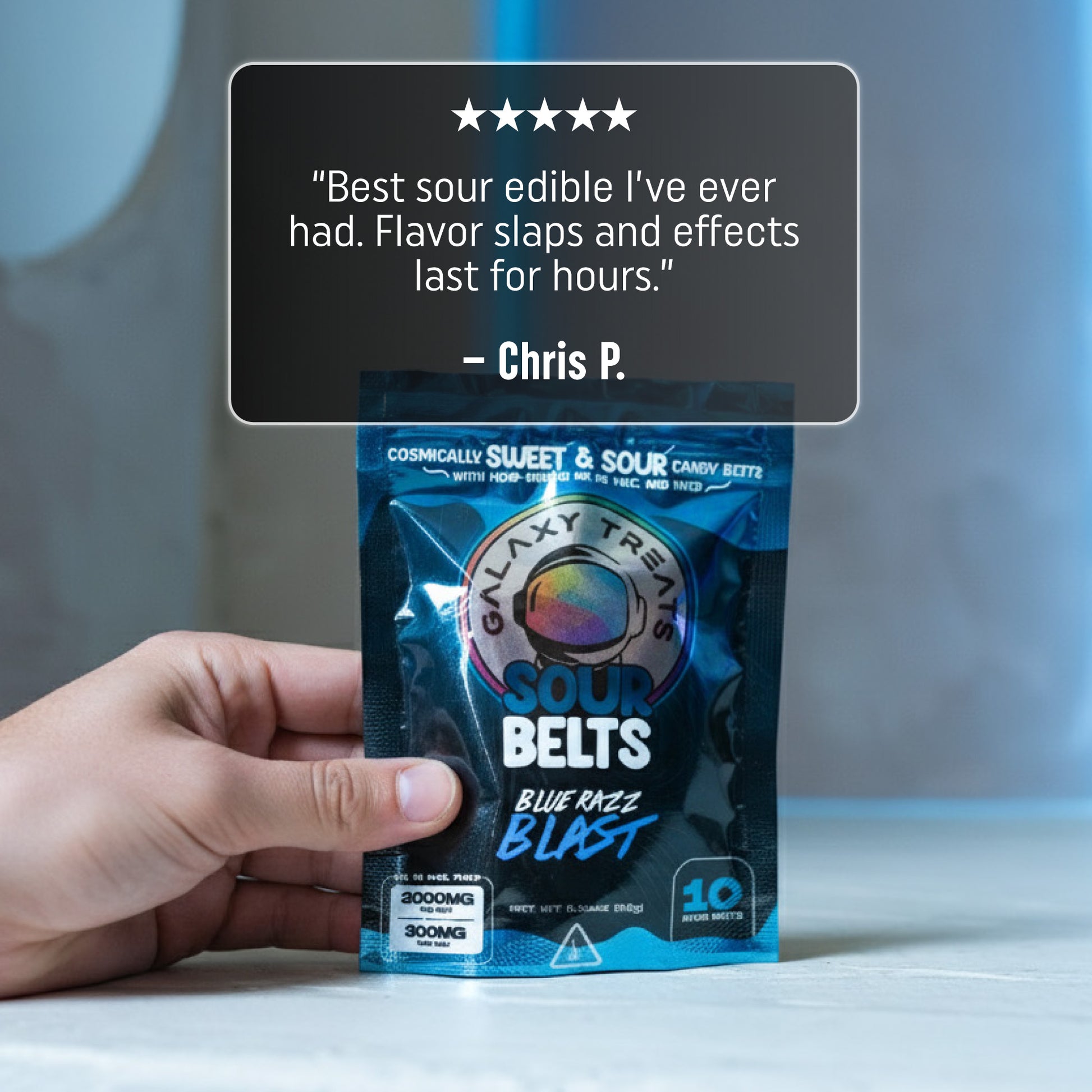 Bluerazz Blast Sour Belts - High Potency 300MG THC Blueberry Flavored Edibles - Hand Holding Packaging - 5 Star Testimonial Review - Galaxy Treats in the U.S.