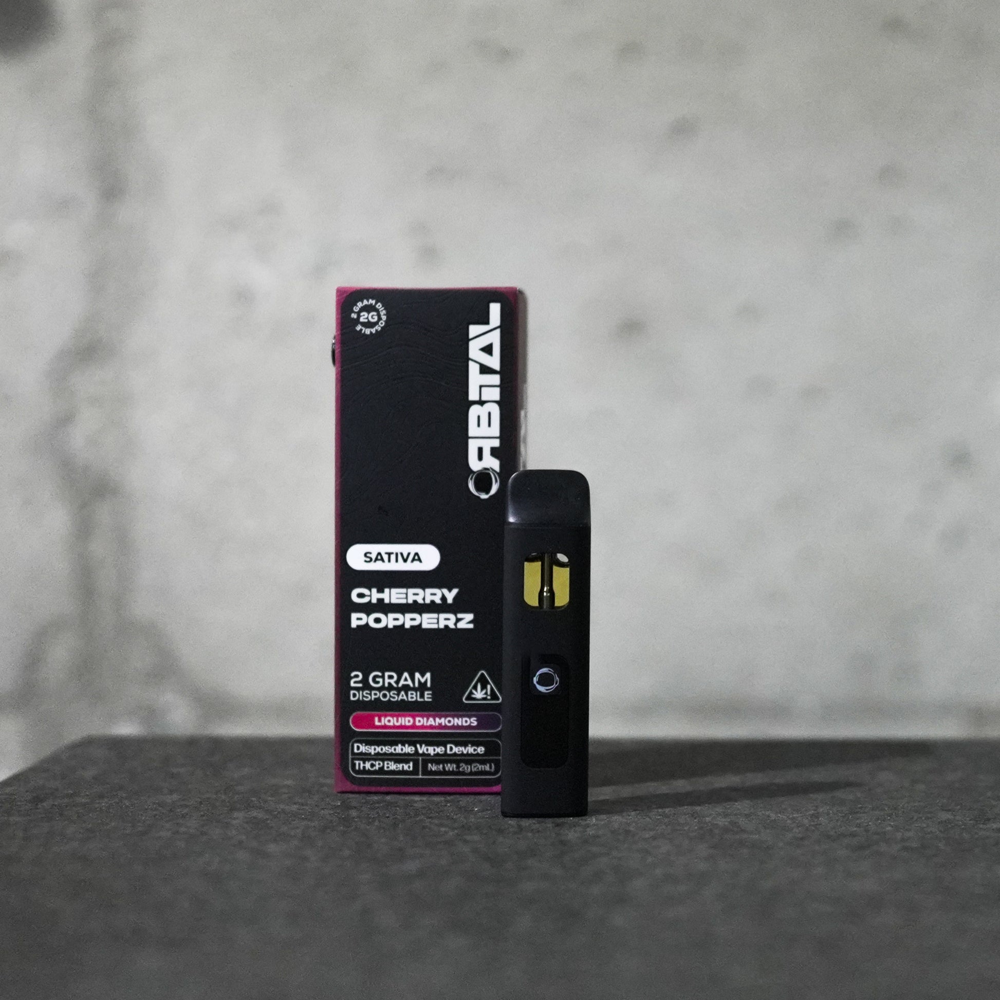Cherry Popperz Vape - Orbital 2G Sativa Disposable - THCP Liquid Diamonds - Front Shot of Packaging and Vape Device - Galaxy Treats in the U.S.