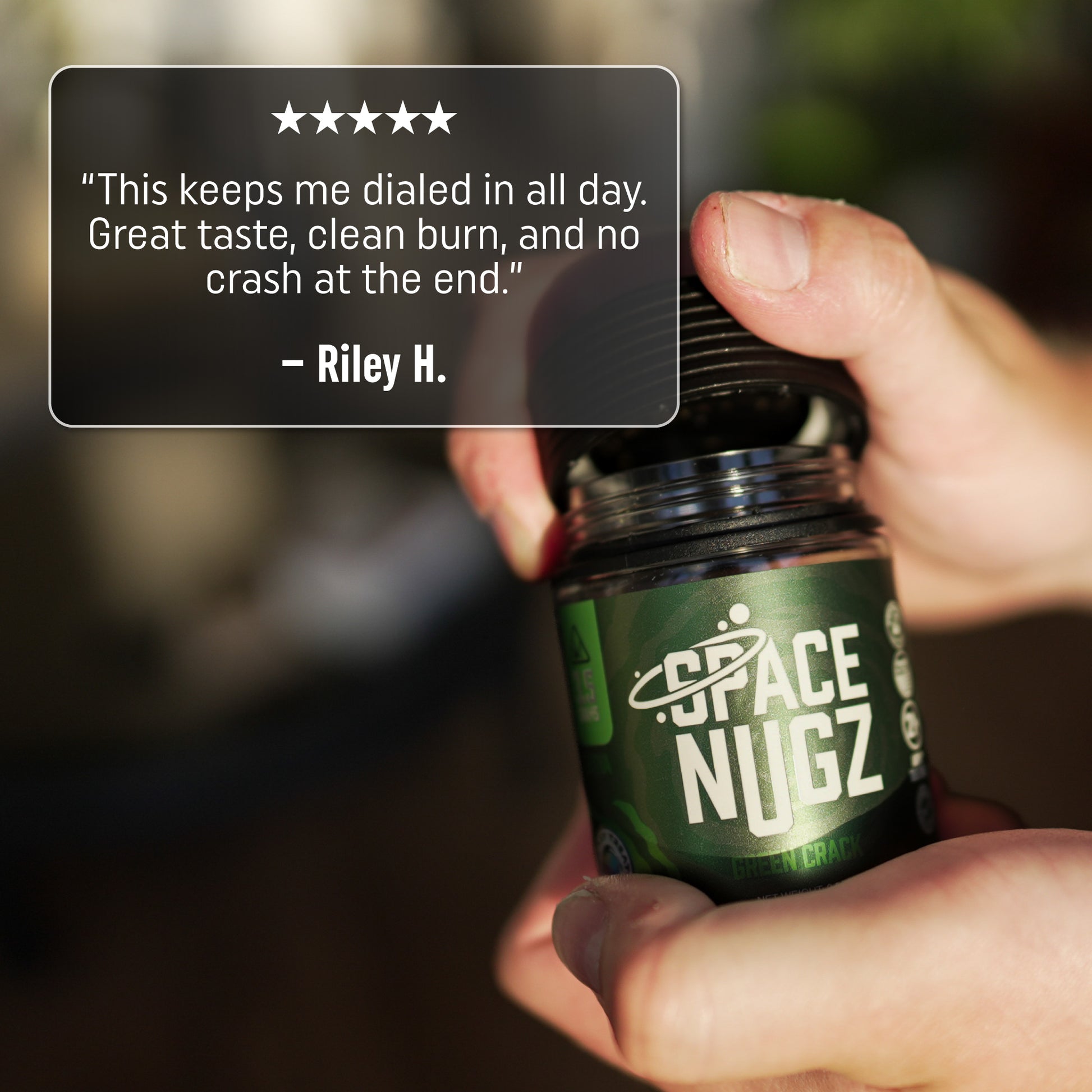Green Crack THCA Flower - Sativa Flower Strain - Man Opening Jar Infront of a Blurred Background - 5 Star Testimonial - Galaxy Treats in the U.S.